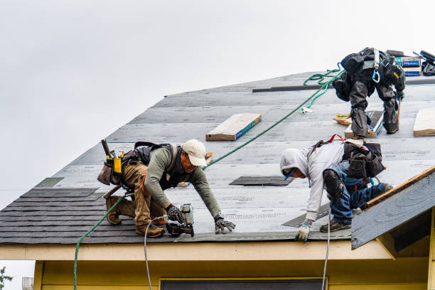 Professional Roof Replacement technician working in Center Point, NM